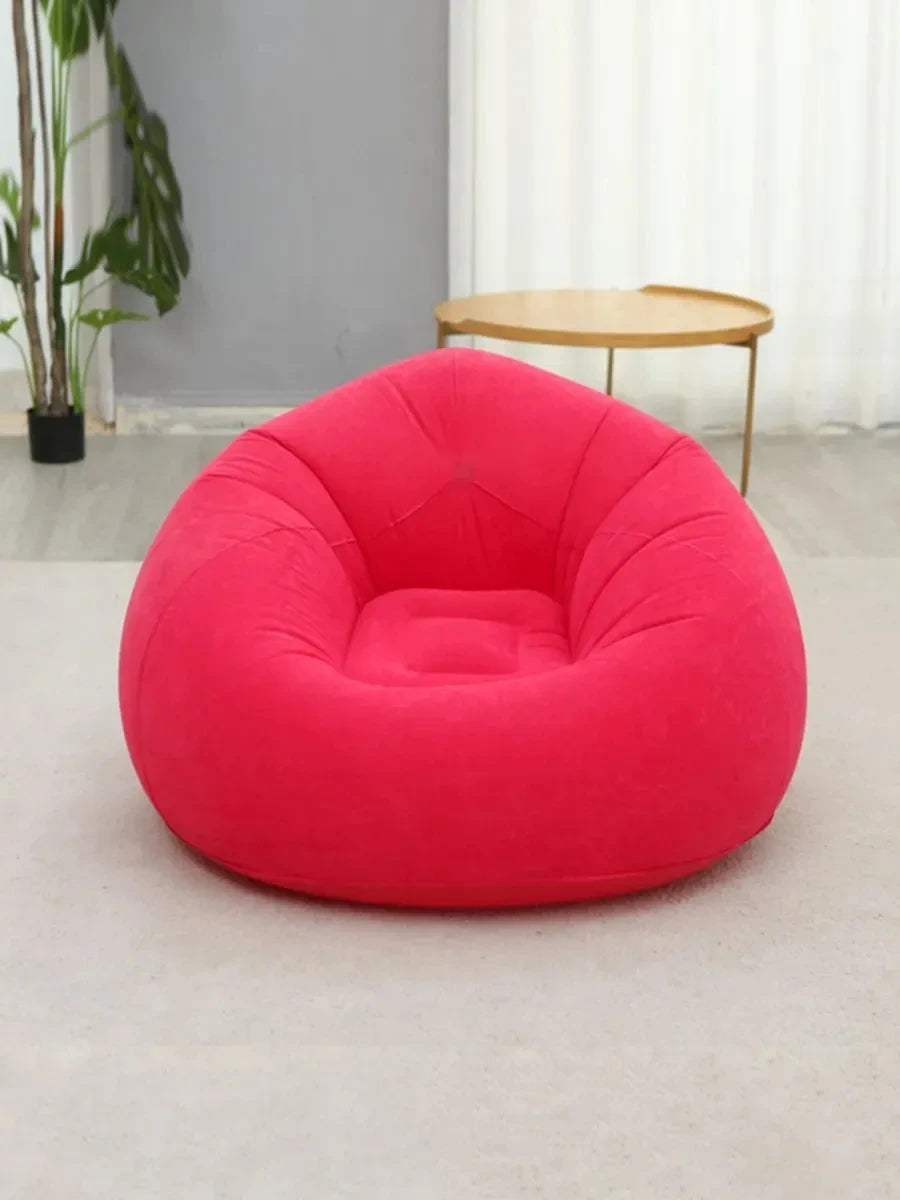 Red inflatable lazy sofa in a living room