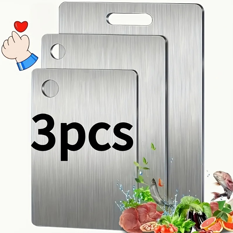 Set of three stainless steel cutting boards stacked together, labeled 3 pieces